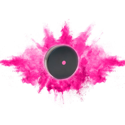 pink powder hockey puck for gender reveal celebration