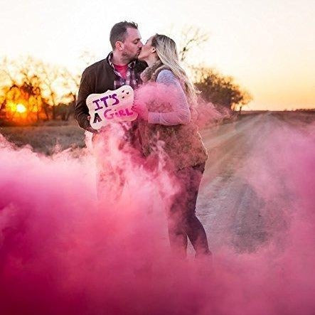 pink smoke bomb for gender reveal party